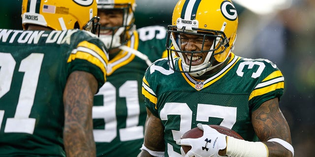 Sam Shields (37) of the Green Bay Packers celebrates after making an interception against the Dallas Cowboys in the first quarter at Lambeau Field Dec. 13, 2015, in Green Bay, Wis.