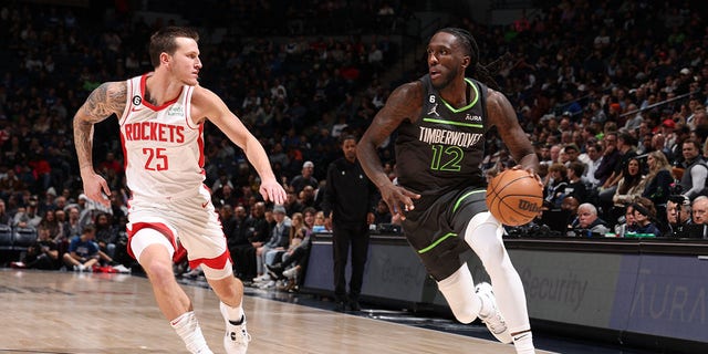 MINNEAPOLIS, MN - NOVEMBER 5: Taurean Prince, #12 of the Minnesota Timberwolves, dribbles the ball during the game against the Houston Rockets on November 5, 2022, at Target Center in Minneapolis, Minnesota. 