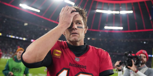 Tampa Bay Buccaneers quarterback Tom Brady leaves the field following an NFL football game against the Seattle Seahawks, Saturday, Nov. 13, 2021, in Munich.