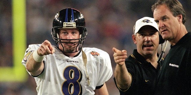 Quarterback Trent Dilfer of the Baltimore Ravens points from the sidelines during Super Bowl XXXV at Raymond James Stadium in Tampa, Florida.