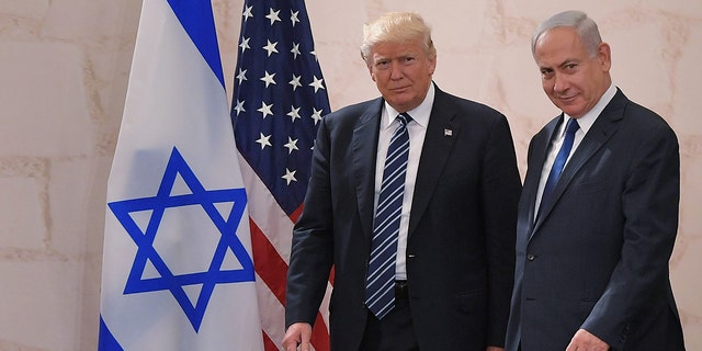 US President Donald Trump (L) arrives at the Israel Museum to speak in Jerusalem on May 23, 2017, accompanied by Israeli Prime Minister Benjamin Netanyahu.