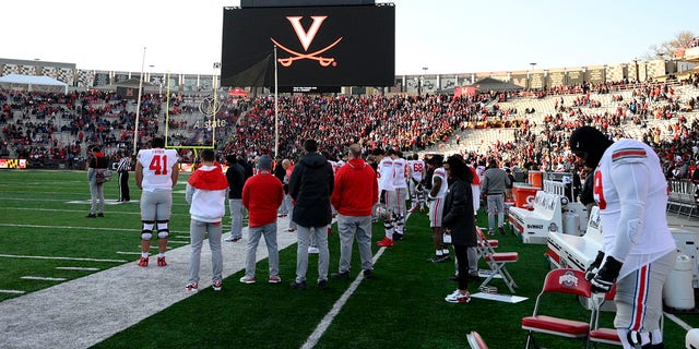 The University of Virginia logo is seen on the scoreboard before an NCAA college football game between Maryland and Ohio State, Saturday, Nov. 19, 2022, in College Park, Md.