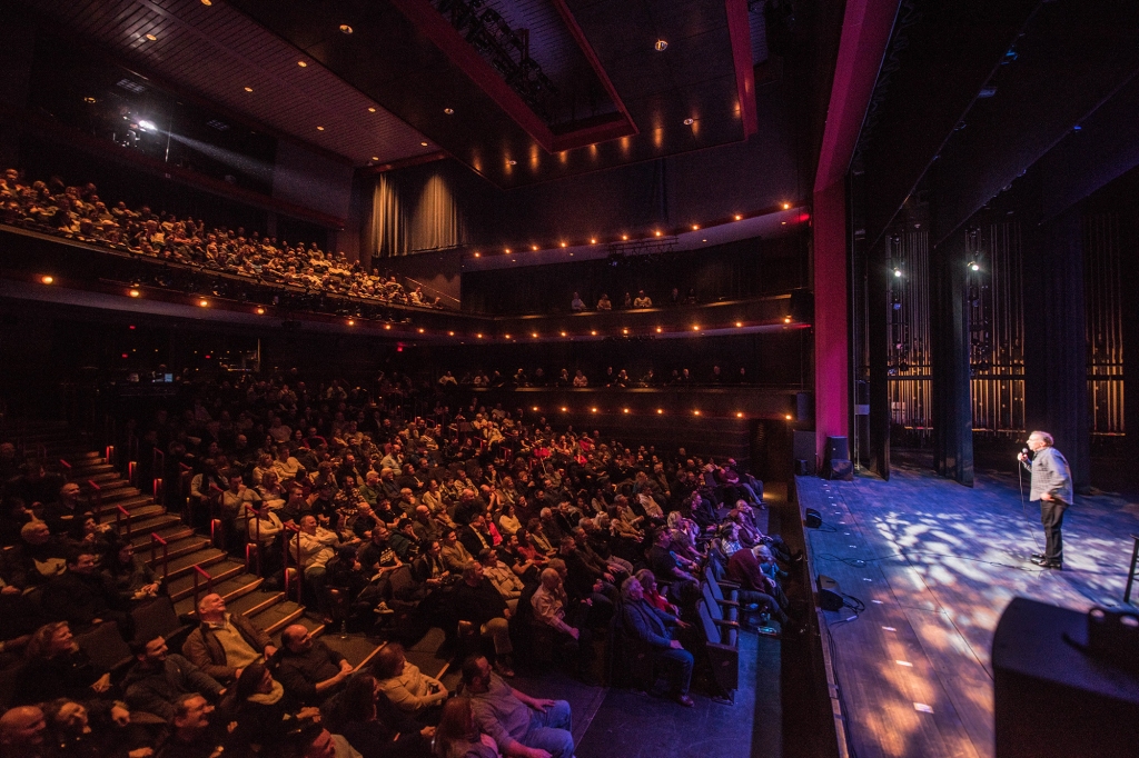 A picture of Vic DiBitetto on stage.