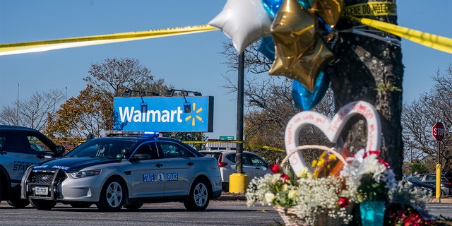 A memorial is seen at the site of a fatal shooting in a Walmart on Nov. 23, 2022, in Chesapeake, Virginia. 