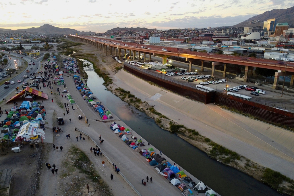 Aerial view of migrants camping on the banks of the Rio Bravo river