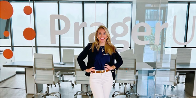 Annabella Rockwell poses for a photo at her new employer, PragerU. 