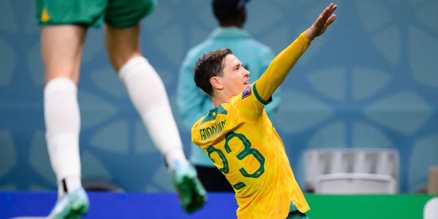 Craig Goodwin of Australia celebrates after scoring his team's first goal during the FIFA World Cup Qatar 2022 Group D match between France and Australia at Al Janoub Stadium Nov. 22, 2022, in Al Wakrah, Qatar.