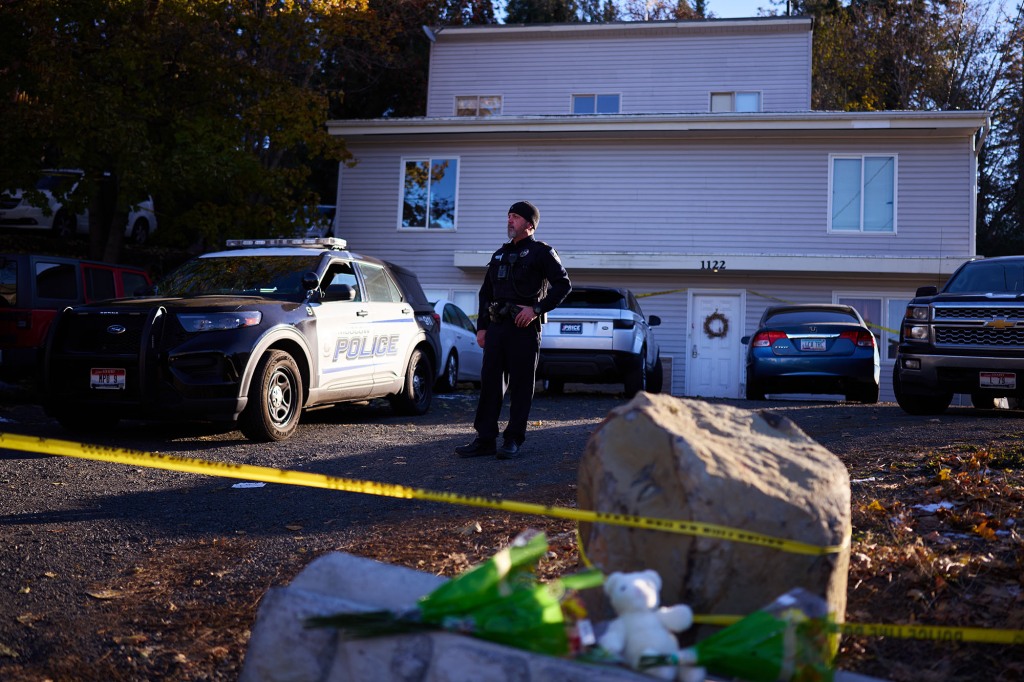 Police at the scene of the murders in Moscow, Idaho.