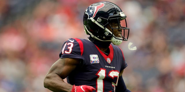 Brandin Cooks of the Houston Texans reacts after making a catch in the first quarter against the Los Angeles Chargers at NRG Stadium Oct. 2, 2022, in Houston.