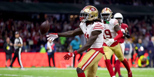 Brandon Aiyuk #11 of the San Francisco 49ers celebrates after scoring a touchdown against the Arizona Cardinals during the third quarter at Estadio Azteca on November 21, 2022 in Mexico City, Mexico.