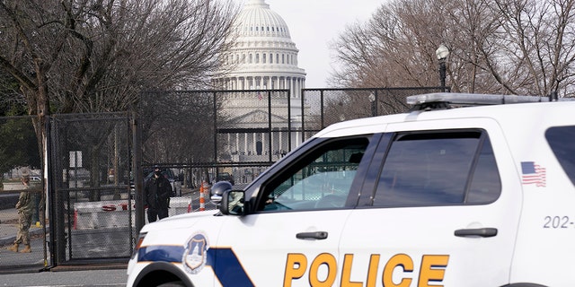 Security surrounds the U.S. Capitol in Washington, Jan. 15, 2021, ahead of the inauguration of President-elect Joe Biden.