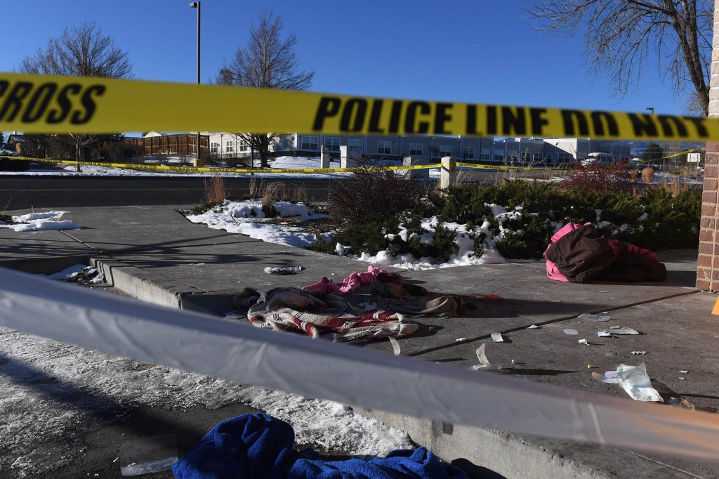 Blood stained clothing is seen on the ground near Club Q