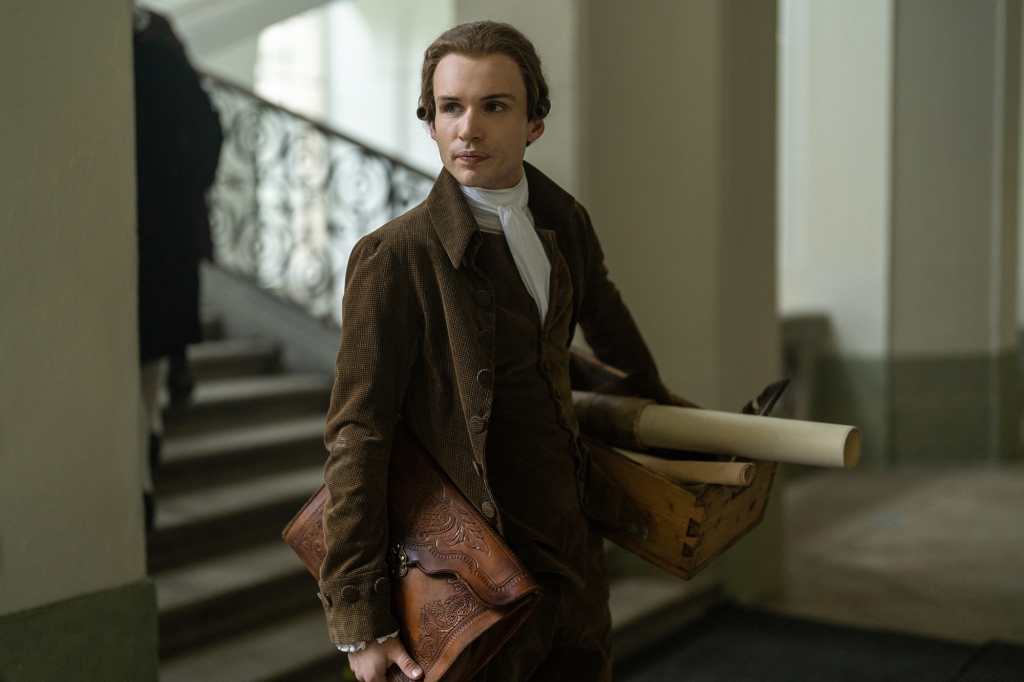 Pascal Valmont (Nicholas Denton) holds a large scroll in "Dangerous Liaisons." 