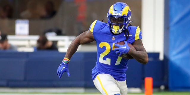 Rams running back Darrell Henderson Jr. rushes against the Cardinals in the second half at SoFi Stadium in Los Angeles, Nov. 13, 2022. The Rams lost 27-17.