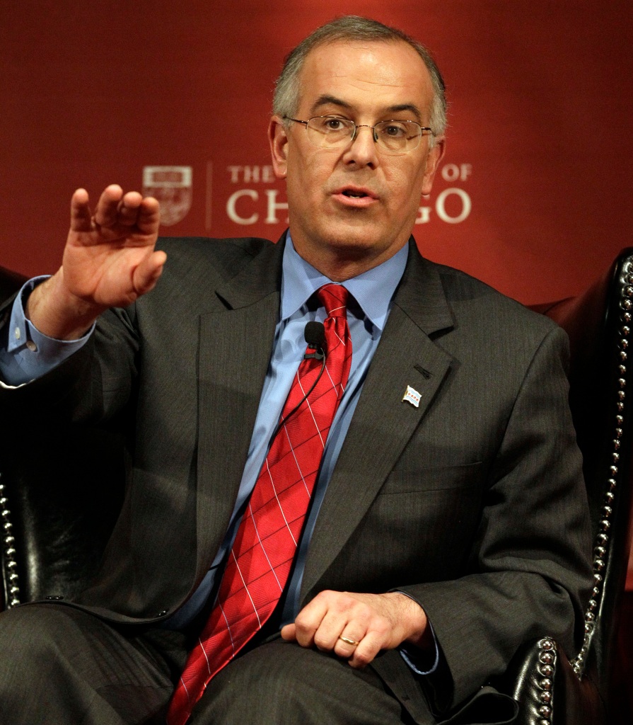 A photo of David Brooks speaking on a panel.