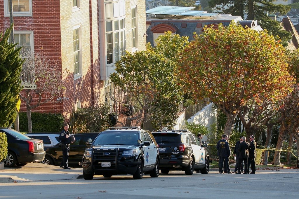 Police monitor and probe around the residence of Nancy and Paul Pelosi in San Francisco following the attack.