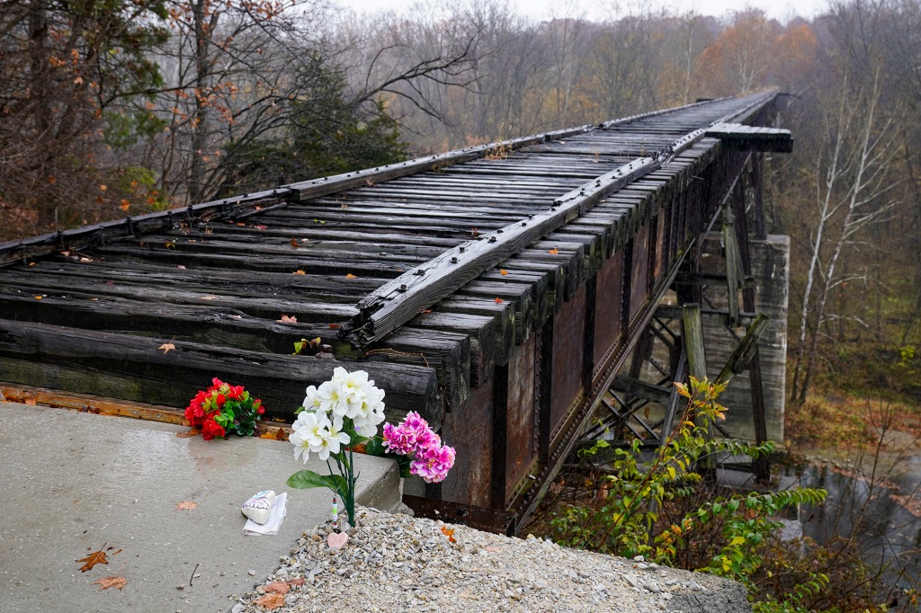 Flowers were placed at the Monon High Bridge Trial after the killings.