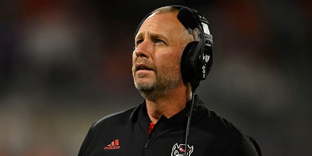 Head coach Dave Doeren of the North Carolina State Wolfpack stands on the sideline in the second quarter against the Clemson Tigers at Memorial Stadium Oct. 1, 2022 in Clemson, S.C. 