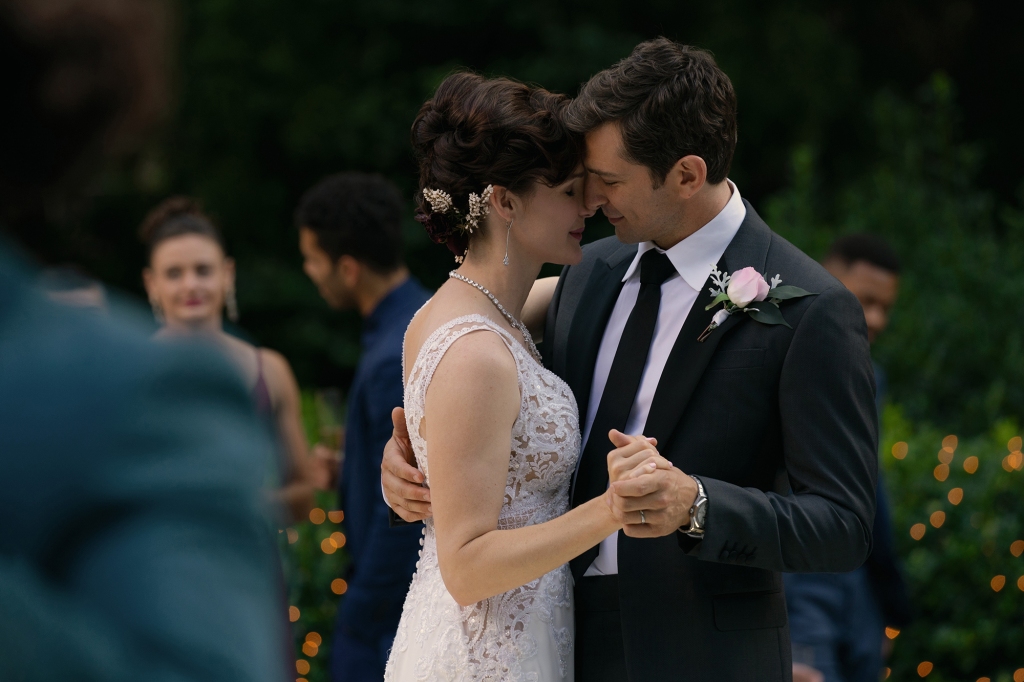 Amber (Jessica Ann Collins) and Prince (Michiel Huisman) dance at their wedding in "Echo 3." 