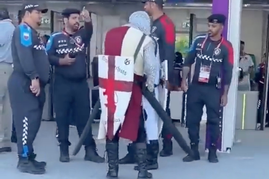 An England fan in a medieval crusader costumes