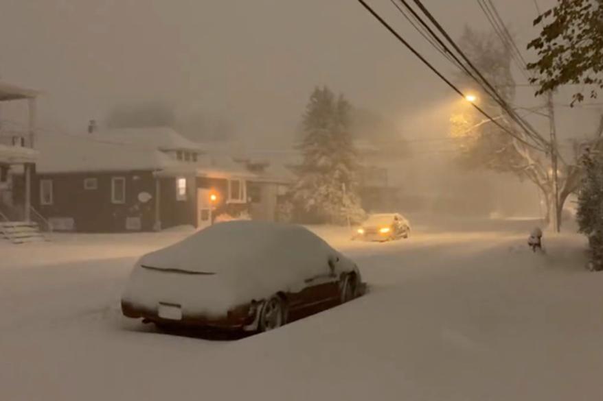 A street in Buffalo already buried in snow on Thursday night.