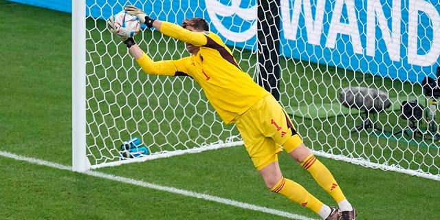 Belgium's goalkeeper Thibaut Courtois blocks a shot during the World Cup Group F soccer match between Belgium and Canada at Ahmad Bin Ali Stadium in Doha, Qatar, Wednesday, Nov. 23, 2022.