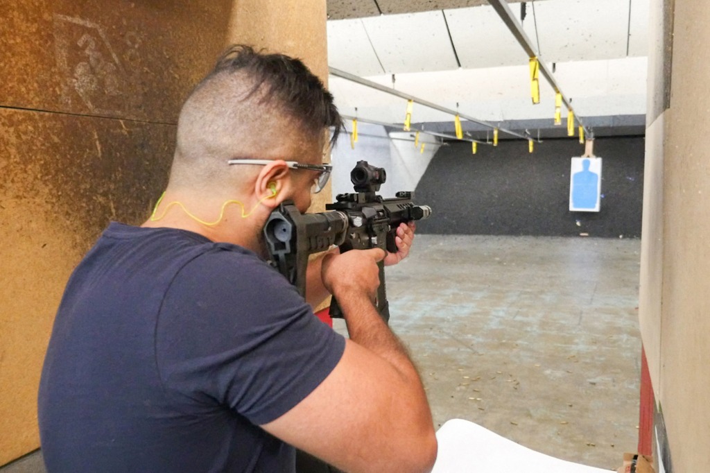 A man practices shooting at a gun range in Houston, Texas, on Oct. 16, 2022.