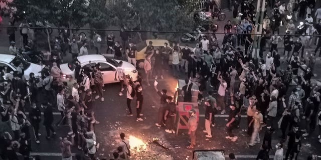 Iranians protest the death of 22-year-old Mahsa Amini, who was detained by the morality police, in Tehran, Sept. 20, 2022.