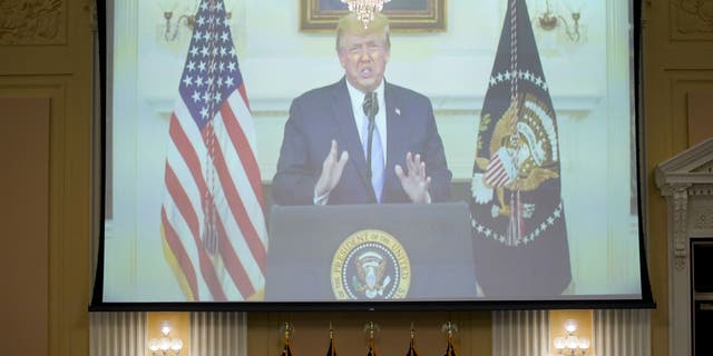 A video of former President Trump played on a screen during a hearing of the Select Committee to Investigate the January 6th Attack on the US Capitol in Washington, D.C., US, on Thursday, July 21, 2022. Trump's 187 minutes of inaction as an armed mob attacked the US Capitol will be the focus of the second prime-time hearing by the House committee investigating the Jan. 6, 2021 insurrection.  