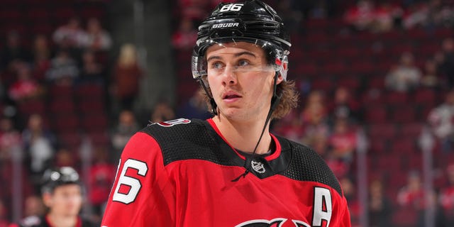 Jack Hughes #86 of the New Jersey Devils looks on prior to the game against the Toronto Maple Leafs at the Prudential Center on November 23, 2022 in Newark, New Jersey.