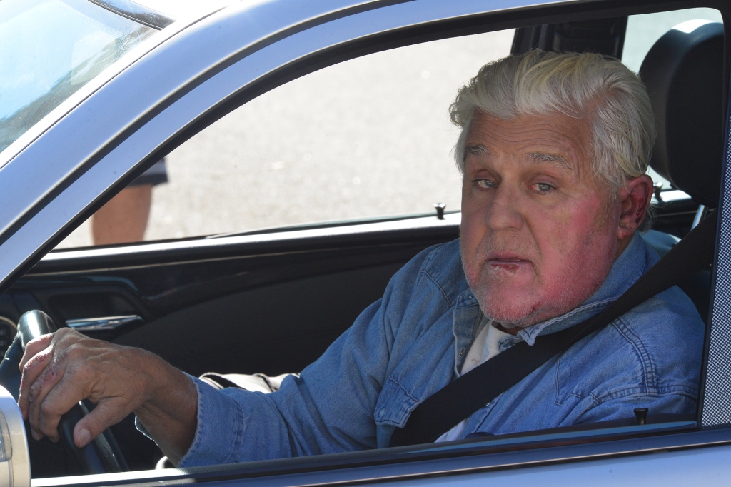 Jay Leno seems to be on the mend with obvious burn signs as is spotted arriving at his car garage in Burbank, Ca