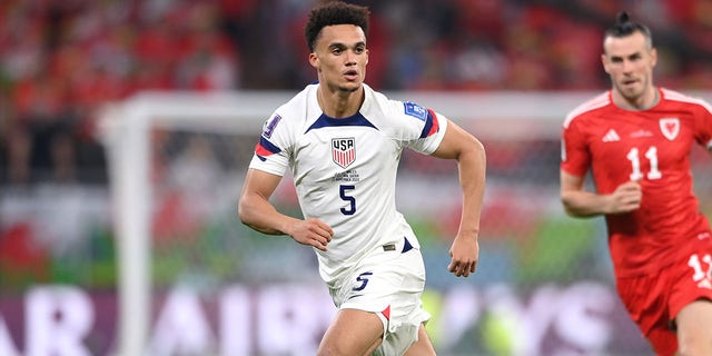 USA player Antonee Robinson in action during the FIFA World Cup Qatar 2022 Group B match between USA and Wales at Ahmad Bin Ali Stadium on November 21, 2022 in Doha, Qatar. 