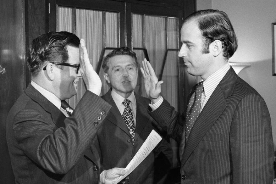 Democratic Senator-elect Joseph Biden, of Delaware is seen here as he takes his oath of citizenship as he checks in at the office of the Secretary of the Senate.