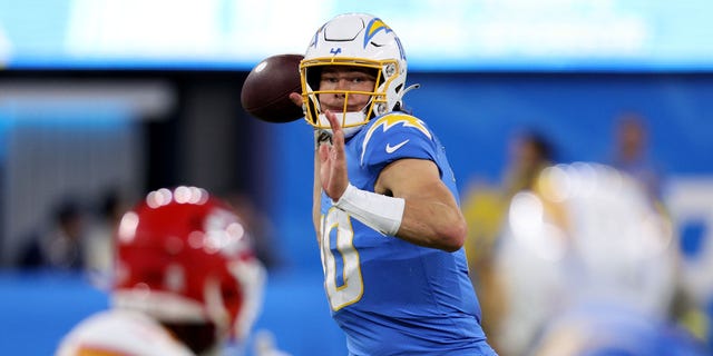 Justin Herbert #10 of the Los Angeles Chargers throws the ball during the second quarter in the game against the Kansas City Chiefs at SoFi Stadium on November 20, 2022, in Inglewood, California. 