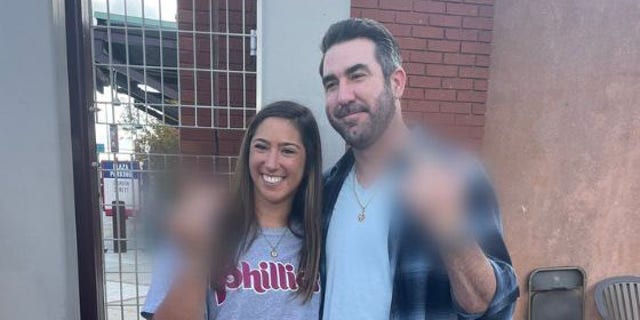 Houston Astros pitcher Justin Verlander and Phillies fan Stephanie Di Ianni flip the bird during interaction before Game 3 of the World Series in Philadelphia, Pa. 