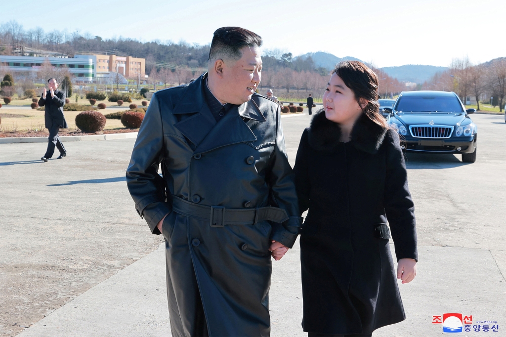 King Jong Un's daughter, Jue Ae, is pictured walking hand-in-hand with her father.