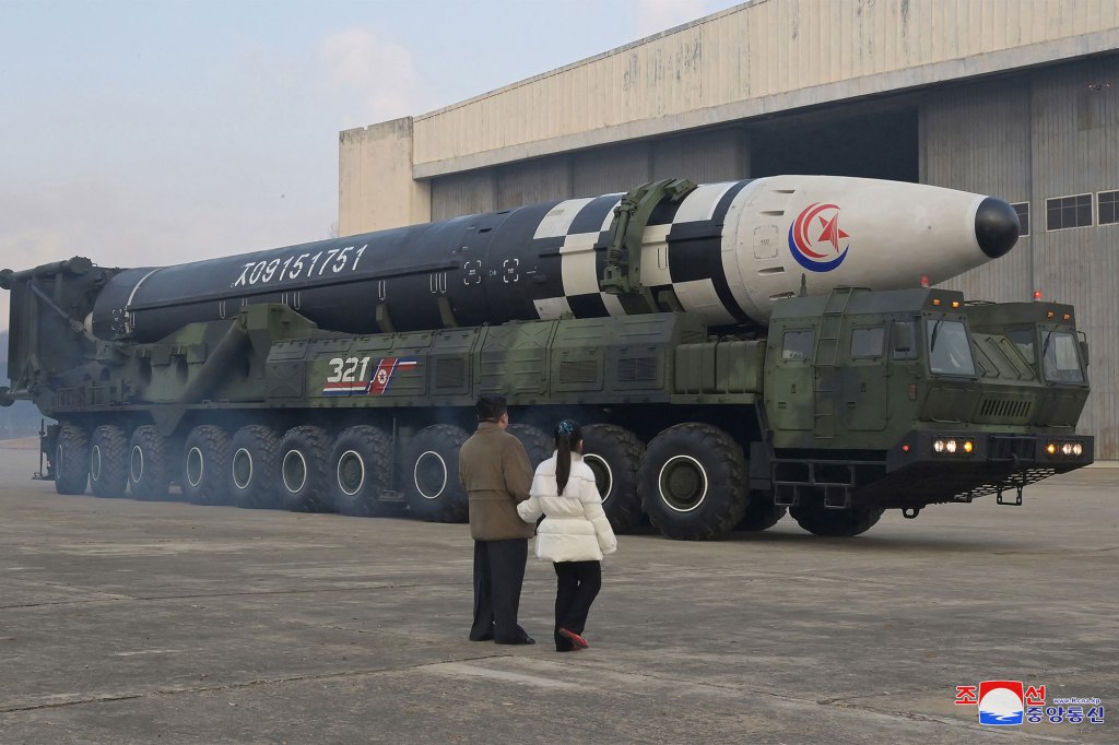 Kim Jong Un, along with his daughter, inspects an intercontinental ballistic missile (ICBM) in this undated photo released on Nov. 19, 2022 by North Korea's Korean Central News Agency (KCNA).