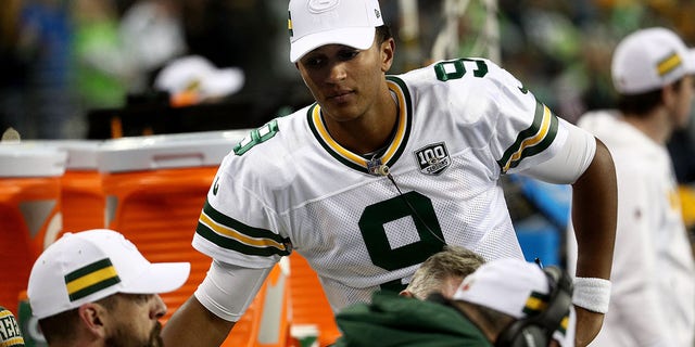 Aaron Rodgers, left, and DeShone Kizer of the Green Bay Packers react on the sidelines against the Seattle Seahawks in the fourth quarter during a game at CenturyLink Field Nov. 15, 2018, in Seattle.  