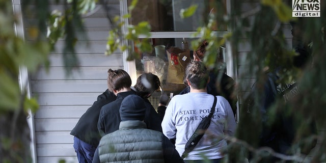 State police forensics look for clues in Moscow, Idaho on Monday, November 21, 2022. Four University of Idaho students who were slain on November 13 in this house.