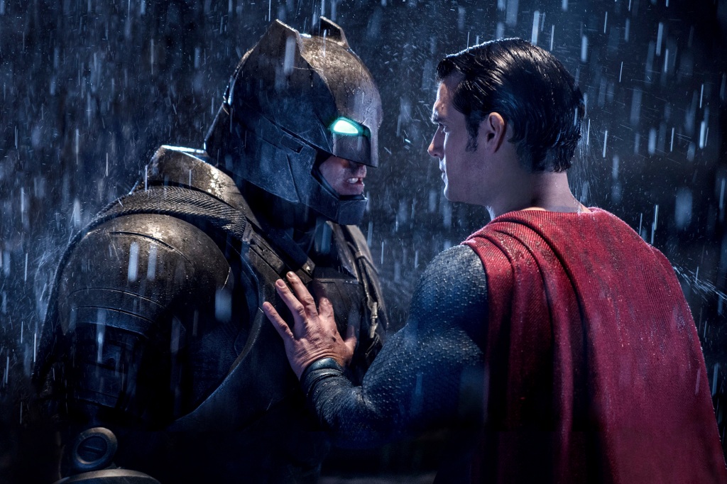 Ben Affleck, left, and Henry Cavill in "Batman v Superman: Dawn of Justice" talking in the rain. 