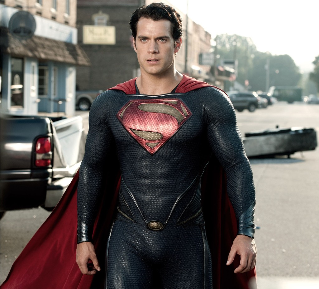 Henry Cavill as Superman standing in a street. 