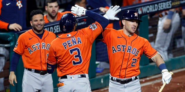 Jeremy Pena #3 of the Houston Astros celebrates with teammate Alex Bregman #2 after hitting a home run against the Philadelphia Phillies during the fourth inning in Game Five of the 2022 World Series at Citizens Bank Park on November 03, 2022 in Philadelphia, Pennsylvania.