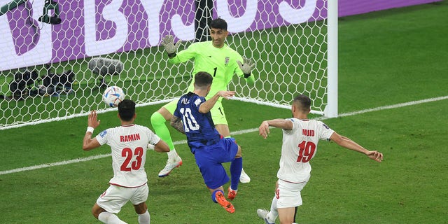 Christian Pulisic of the United States scores during a FIFA World Cup Qatar 2022 Group B match against Iran at Al Thumama Stadium Nov. 29, 2022, in Doha, Qatar.