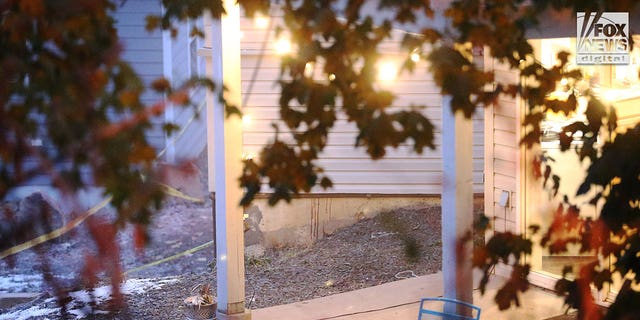 Red stains running down the foundation of a house where four college students were murdered in Moscow, Idaho. 