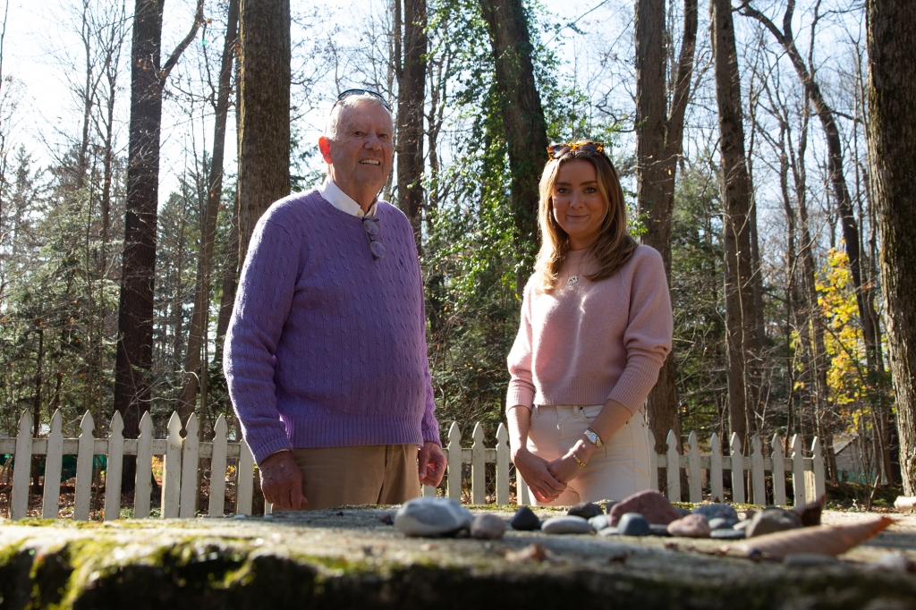 Rikki and Dick Schlott pay a visit to “Inspiration Stump,” a place in the Lily Dale woods where messages and lectures are delivered.