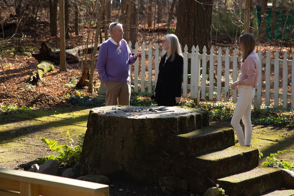 The Schlotts meet with local psychic Bobbie Caswell at “Inspiration Stump.”