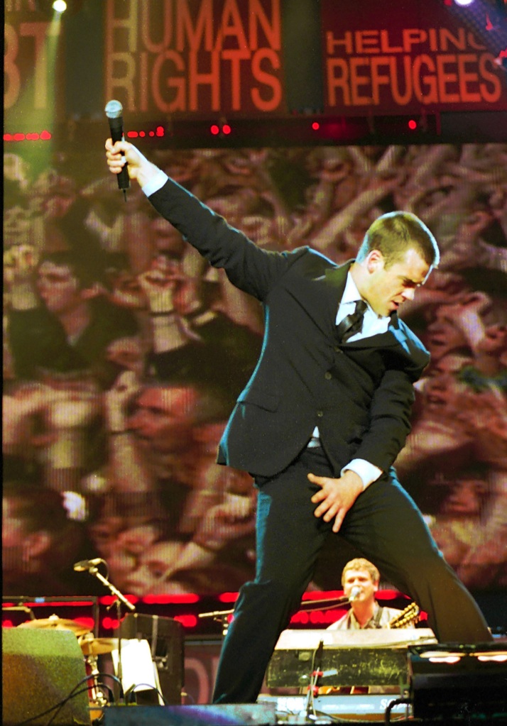 Robbie Williams on stage