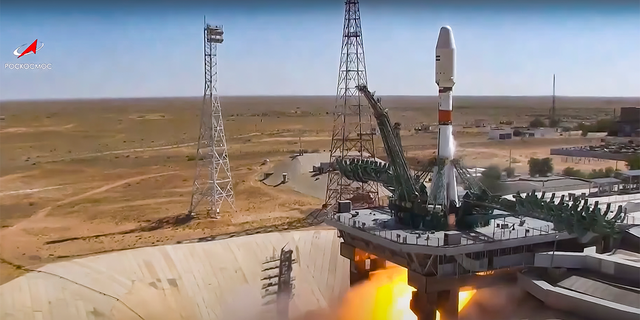 A Russian Soyuz rocket lifts off to carry an Iranian Khayyam satellite into orbit, near Baikonur, Kazakhstan, on Aug. 9, 2022.