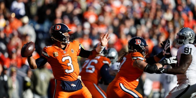 Russell Wilson, #3 of the Denver Broncos, passes during an NFL game between the Las Vegas Raiders and Denver Broncos at Empower Field At Mile High on Nov. 20, 2022 in Denver.