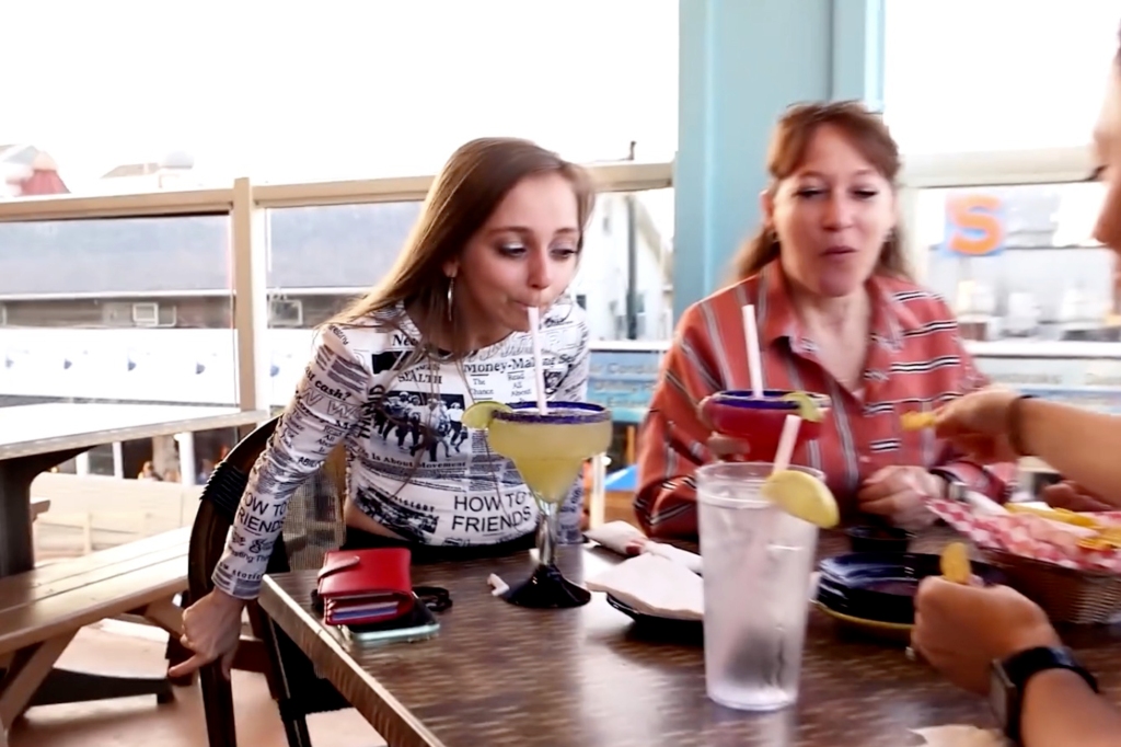 Shauna Rae drinking with her mom. 